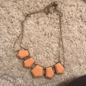 Peach colored necklace